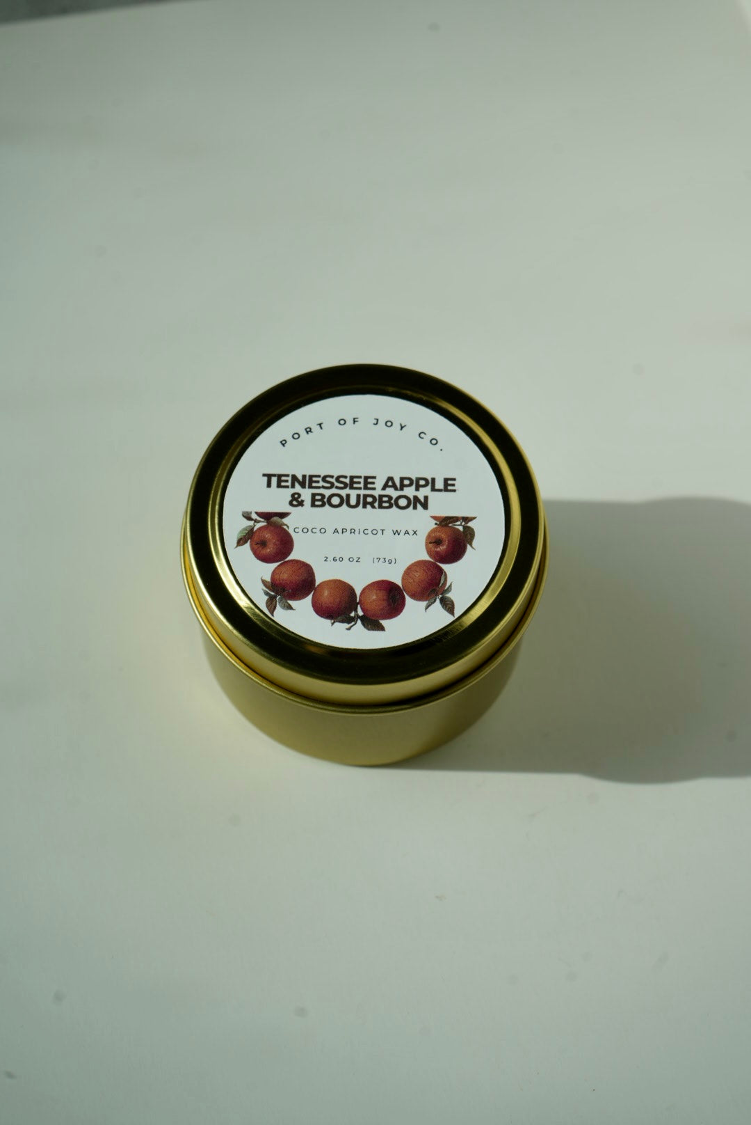 Apple Bourbon 4 oz candle with warm apple, bourbon and maple fragrance