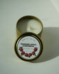 Apple Bourbon 4 oz travel tin candle with warm fall fragrance