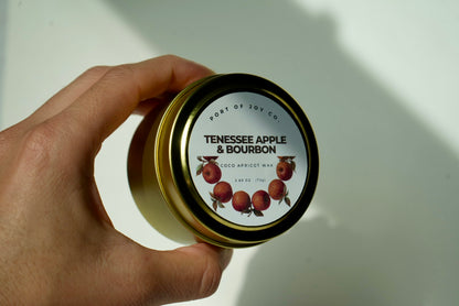 Cozy fall Apple Bourbon scented candle in reusable travel tin
