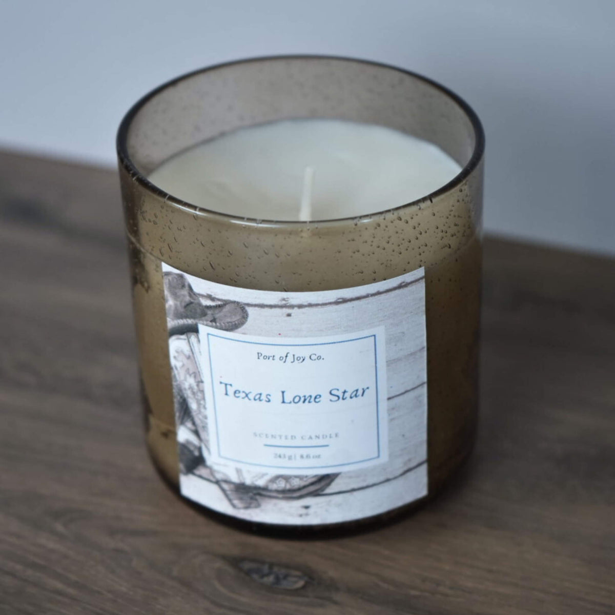 Handmade candle for rustic, western, or modern home decor with a warm woodsy fragrance.