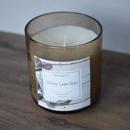 Handmade candle for rustic, western, or modern home decor with a warm woodsy fragrance.