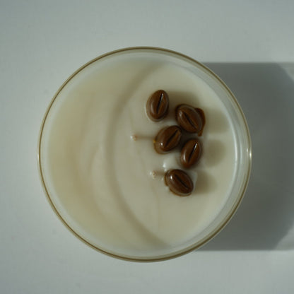 top of coffee candle with coffee beans add ons as decoration