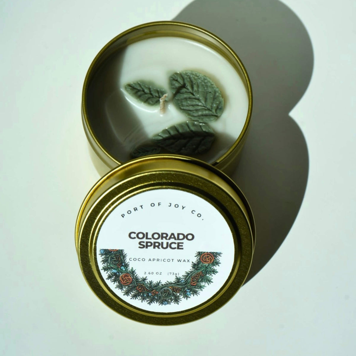travel tin candle with blue spruce scent