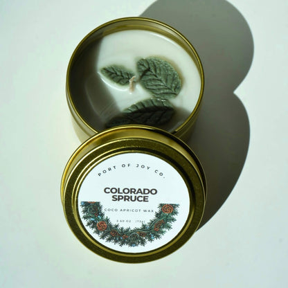 travel tin candle with blue spruce scent