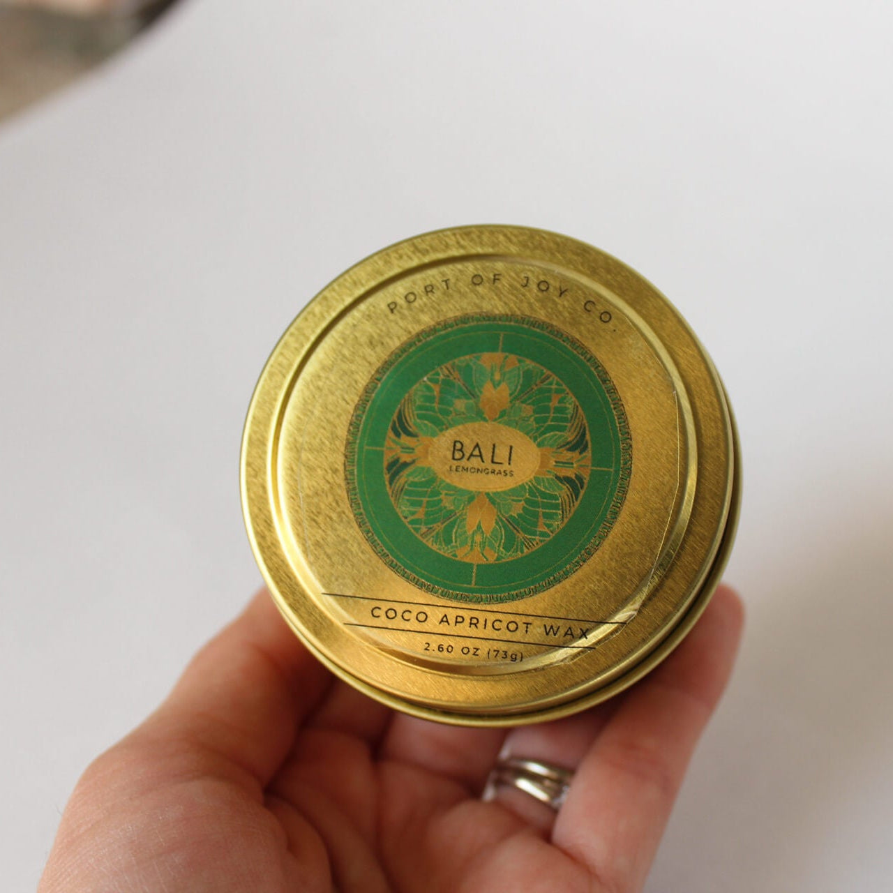 gold tin candle with scent bali lemongrass