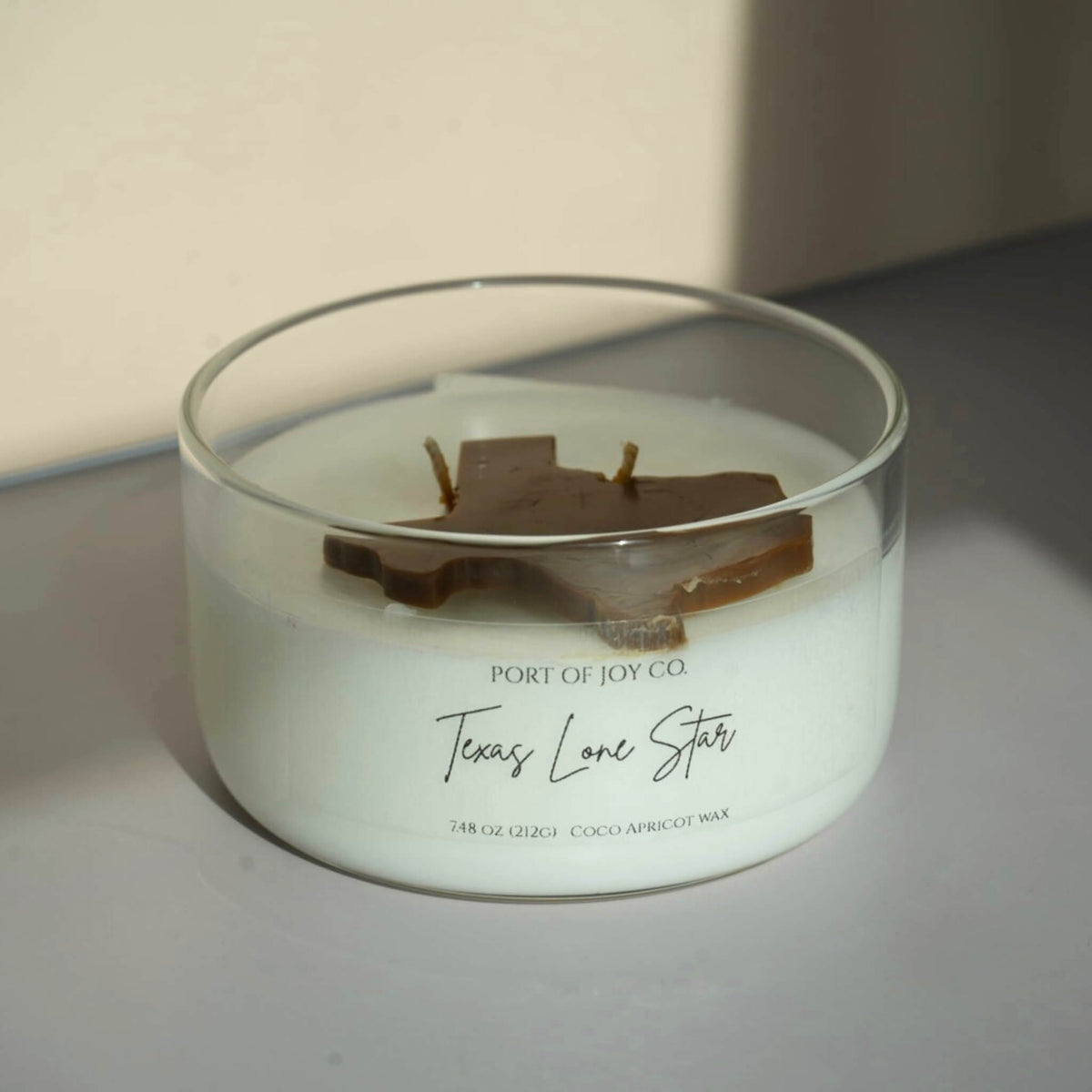Handmade two-wick candle inspired by golden Texas sunsets and wide-open landscapes.