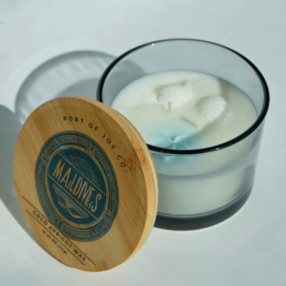 maldives bungalow candle open