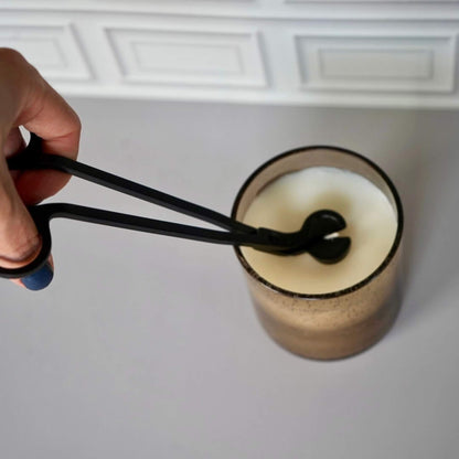 trimming candle wick using the black wick trimmer
