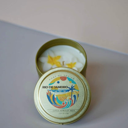 Open tin with 'Rio de Janeiro' design on a light gray background