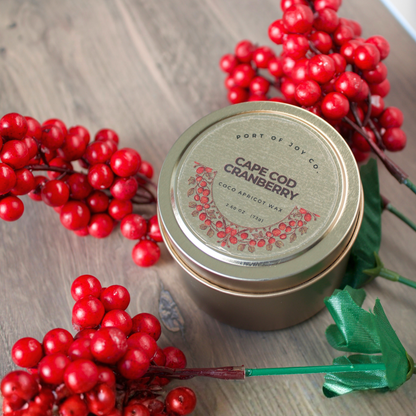 Cape Cod Cranberry vegan candle in a rose gold tin, hand-poured with a festive holiday scent. A perfect eco-friendly Christmas stocking stuffer or white elephant gift.