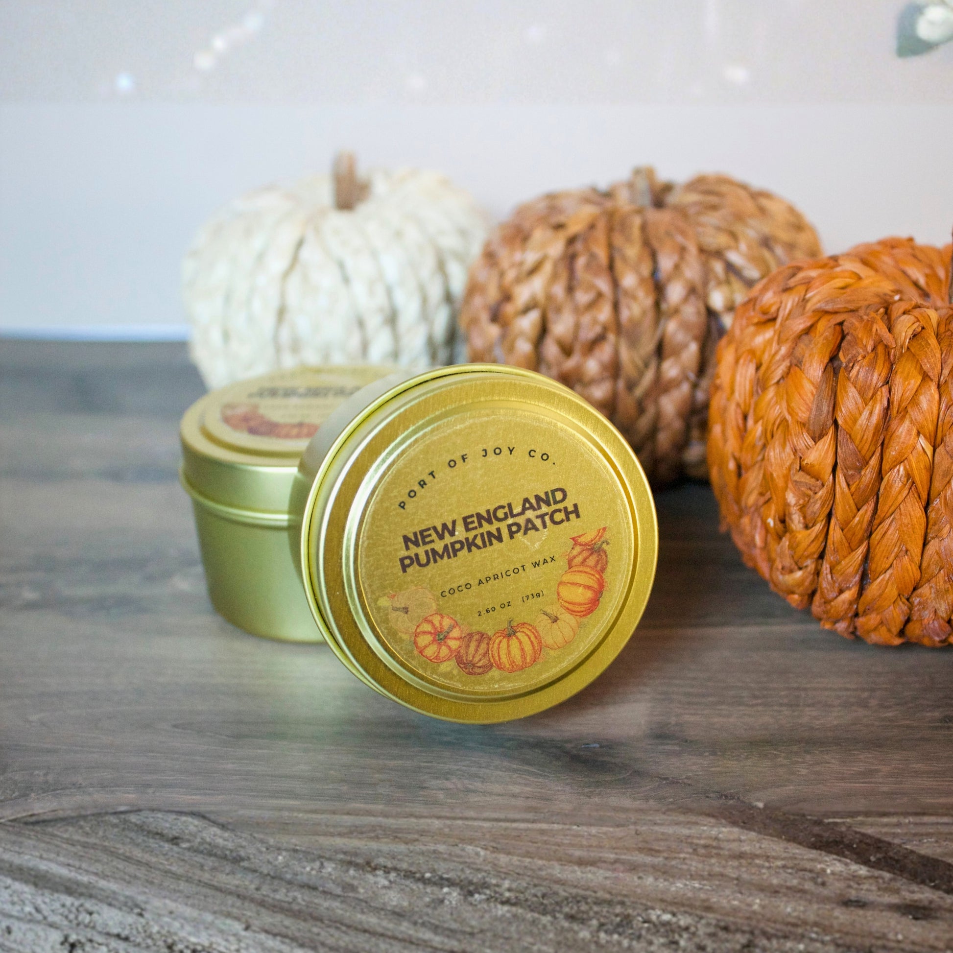 Port of Joy travel-size tin candle with Pumpkin Caramel scent, made with sustainable, eco-friendly ingredients, minimalist design, and a perfect gift for her.