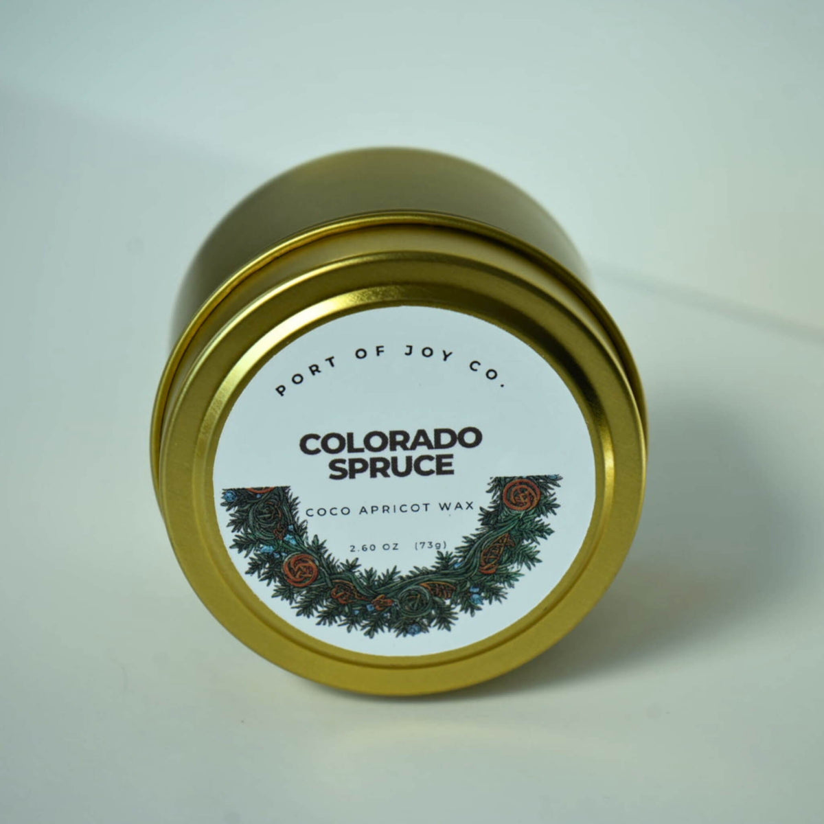 winter spruce scented tin candle