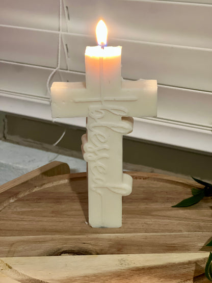 Video of handmade blessed cross soy candle showcasing details and design. Christian gift and religious decor.