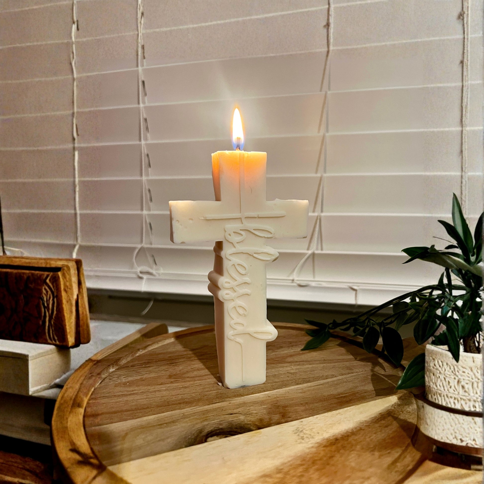 Handmade cross pillar candle. religious gift and blessed party favor for Christian celebrations.