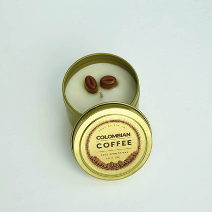colombian coffee travel gold tin candle with lid.