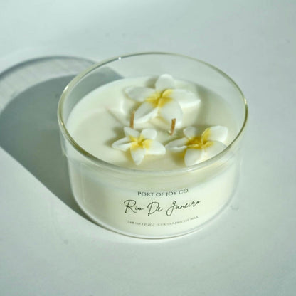 Handmade Rio de Janeiro inspired candle with tropical plumeria and creamy vanilla fragrance.