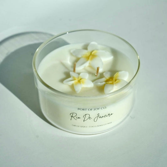 Handmade Rio de Janeiro inspired candle with tropical plumeria and creamy vanilla fragrance.
