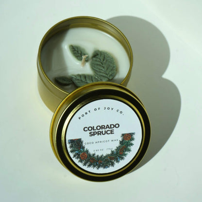 travel tin colorado spruce candle open