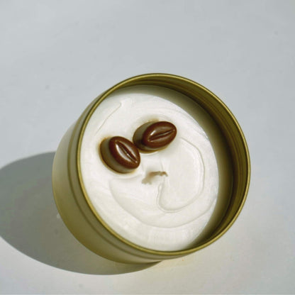 inside of travel tin candle scented with coffee fragance and coffee beans